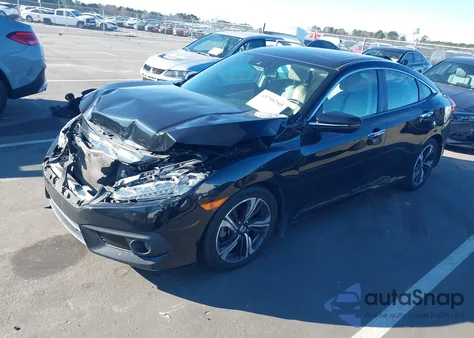 2016 Honda Civic Touring from USA, damaged, VIN 19XFC1F9XGE005365